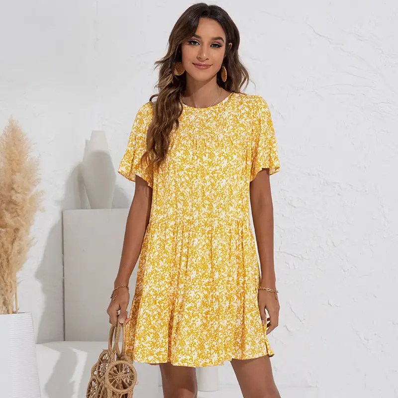 Stay Stylish this Summer with our Loose Fitting Floral Summer Dress for Women - Featuring Round Neck and Fragmented Leaf Sleeves!