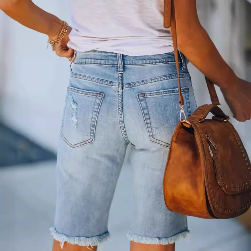 Get the Ultimate Ripped Look with New Styla's Washed Cotton Tassel Ripped Shorts for Women