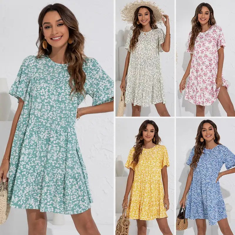 Stay Stylish this Summer with our Loose Fitting Floral Summer Dress for Women - Featuring Round Neck and Fragmented Leaf Sleeves!